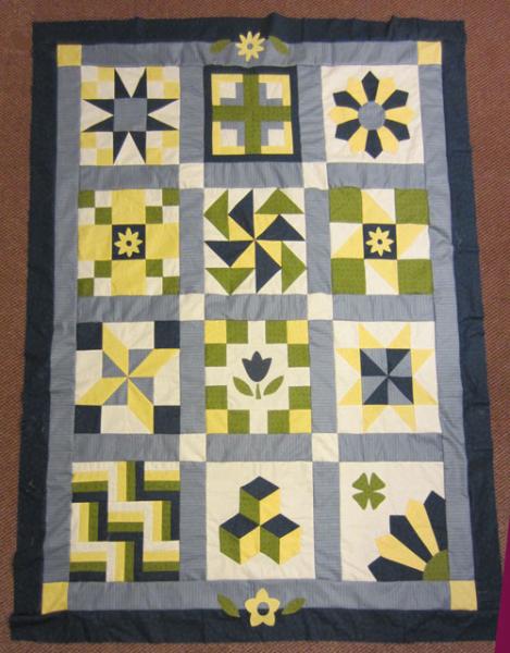 Blue and yellow sampler quilt